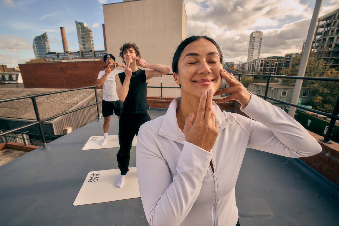 Maria leading a face-sculpting session on a London rooftop